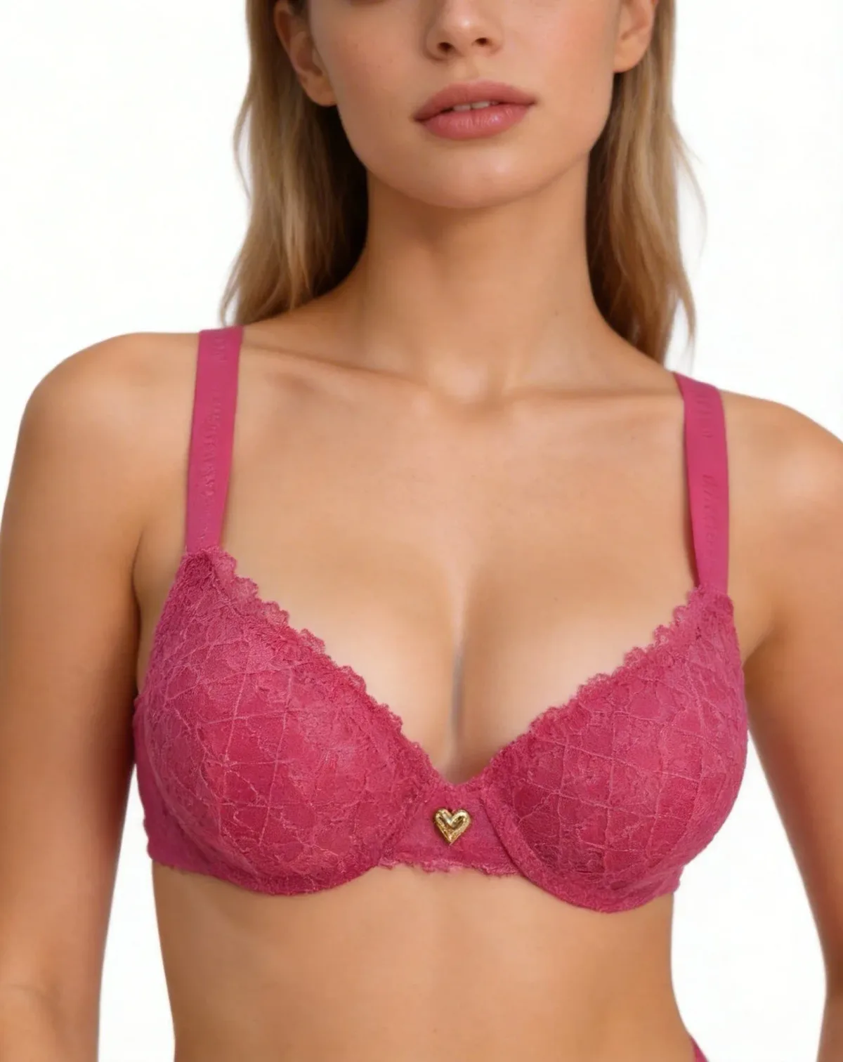 gold heart charm on the fuchsia lace push-up bra
