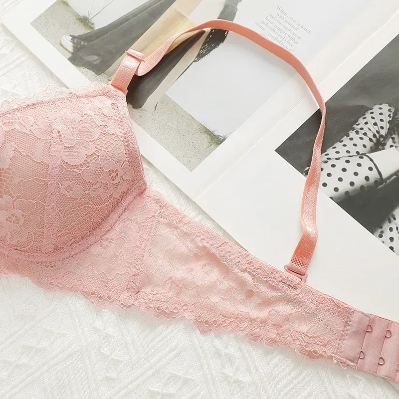 delicate lace side wing of the pink push-up bra