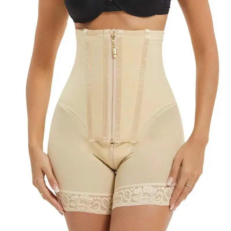 lace trimmed legs of the beige shaping shorts