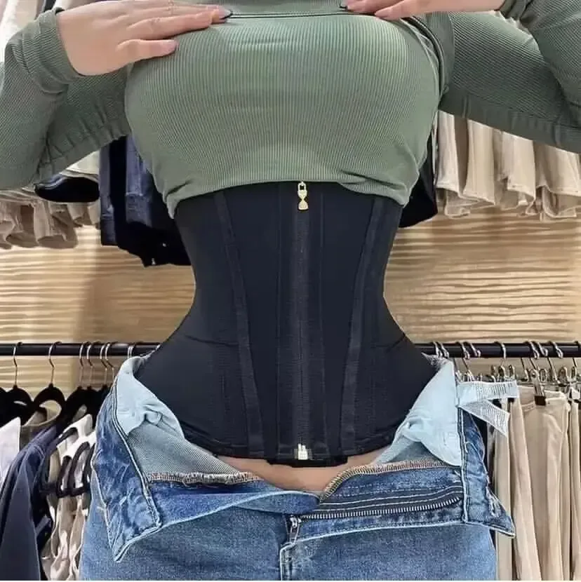 Waist cincher worn with jeans under a top