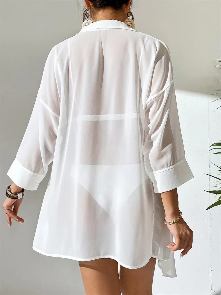 relaxed back and dropped shoulders of the cover up