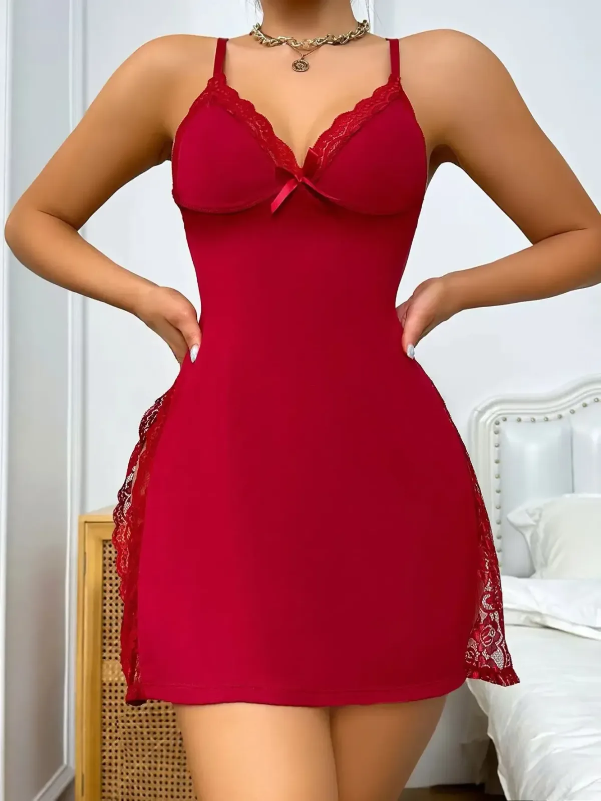 lace V neckline with a centre bow