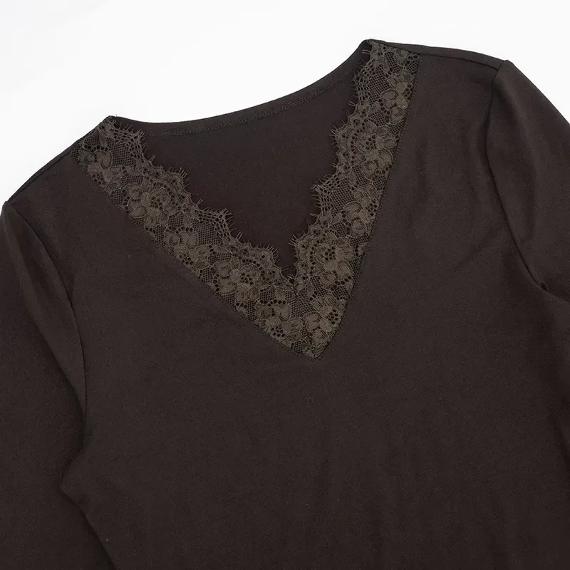 scalloped lace V neckline close up