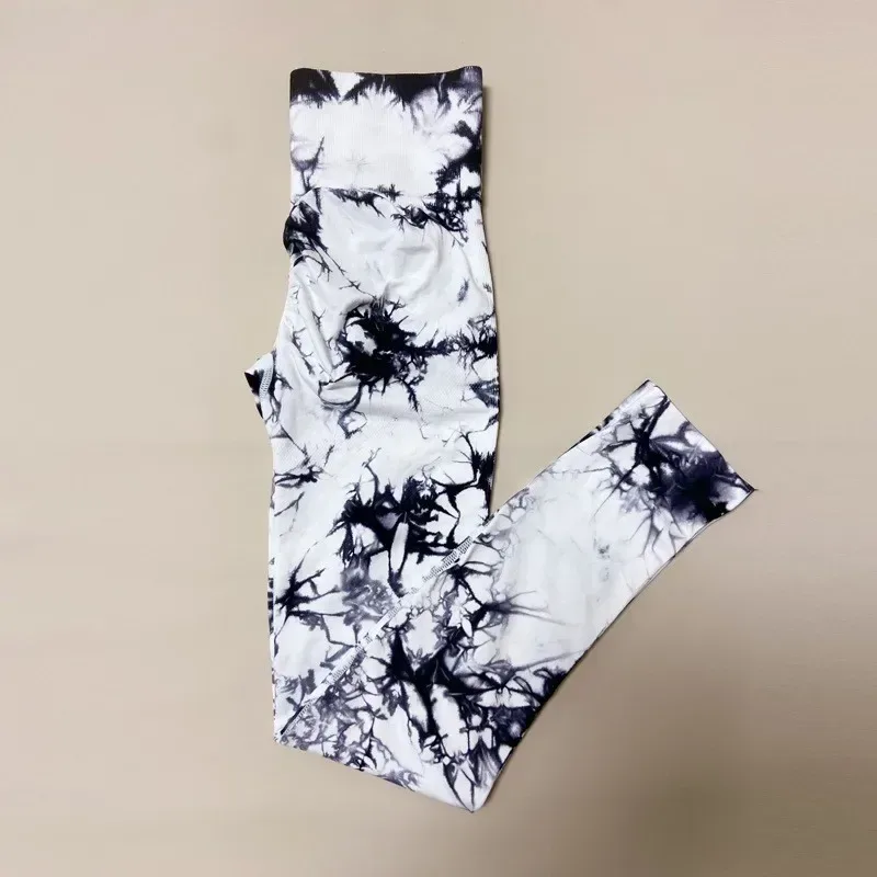 white and navy marble leggings laid flat