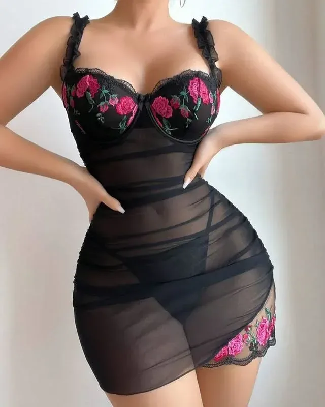 asymmetric embroidered hem of the black nightie
